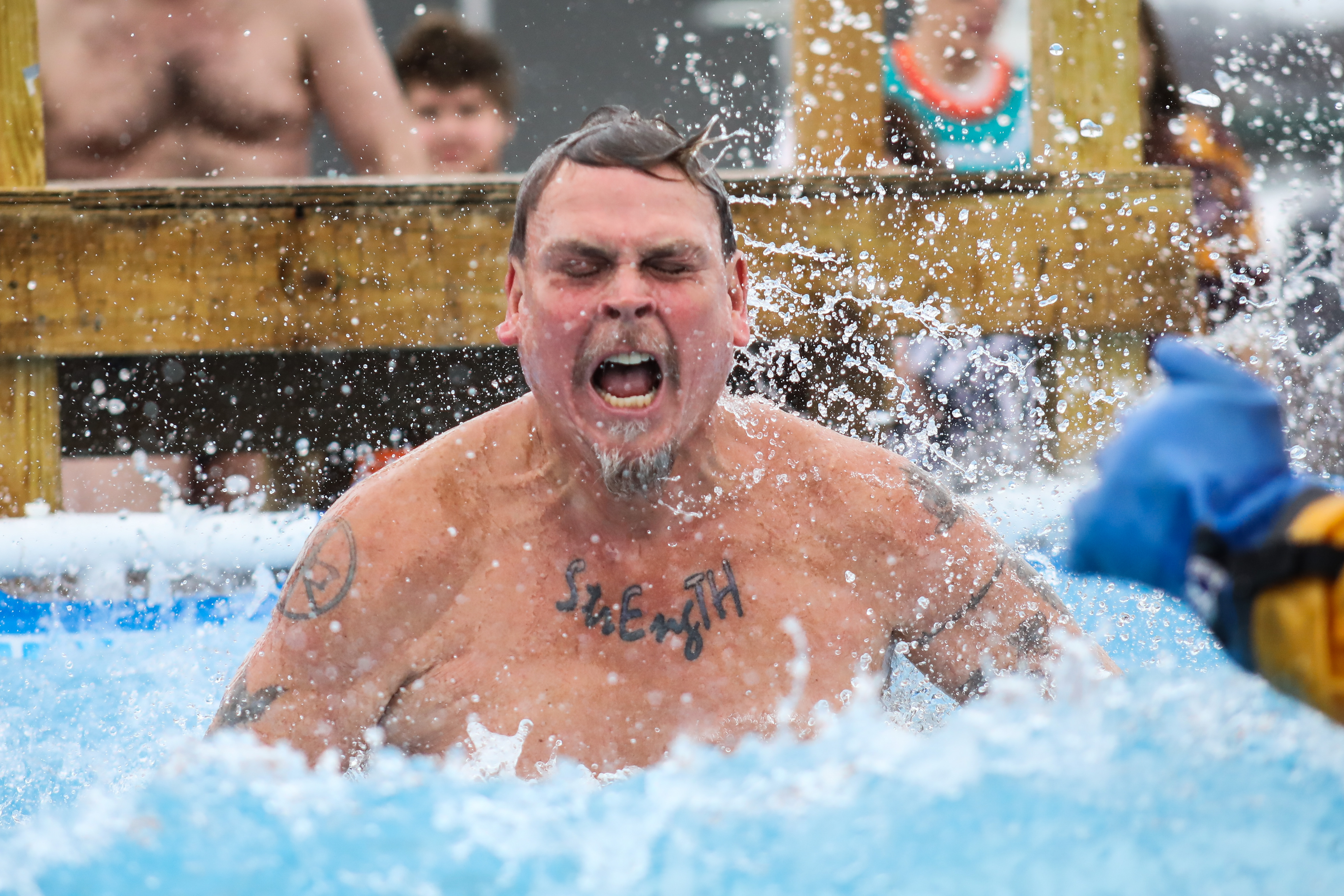 A jumper in the 2019 Polar Plunge finding out just how cold the water really is in Mt. Pleasant, MI.