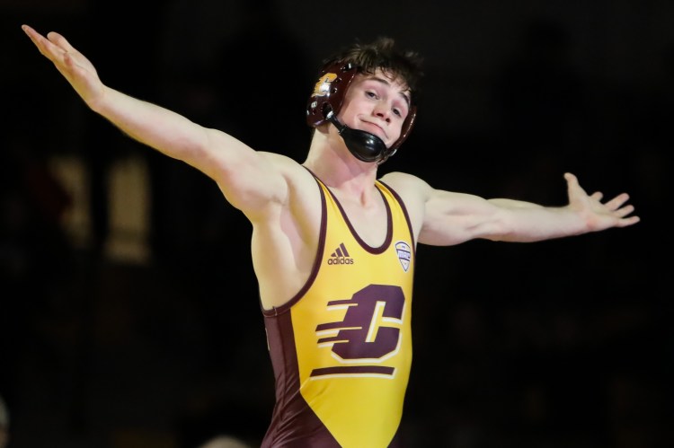 Granger, IN, redshirt junior Drew Hildebrandt celebrates a bit after his first-round pin of his opponent.