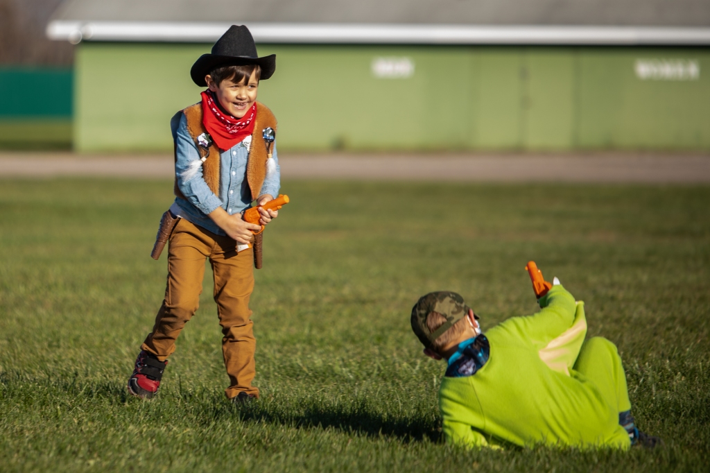 Lucas Tembreull (left) and Eddie Hope (right) play while their parents pass out candy at the 2020 Boo Bash at the Isabella County Fairgrounds.